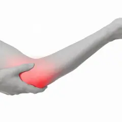 En arm med en rödmarkerad armbåge, som indikerar smärta vid artros armbåge.